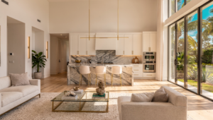 Luxury interior inside The Estates at NOMAR West Palm Beach featuring modern kitchen and open living space